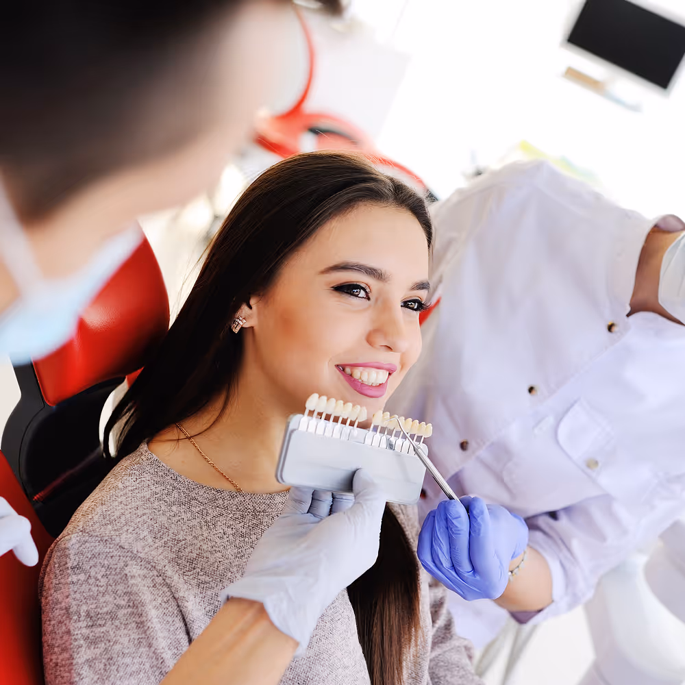 Close-up of porcelain veneers shade-matched to a natural smile in Houston, TX