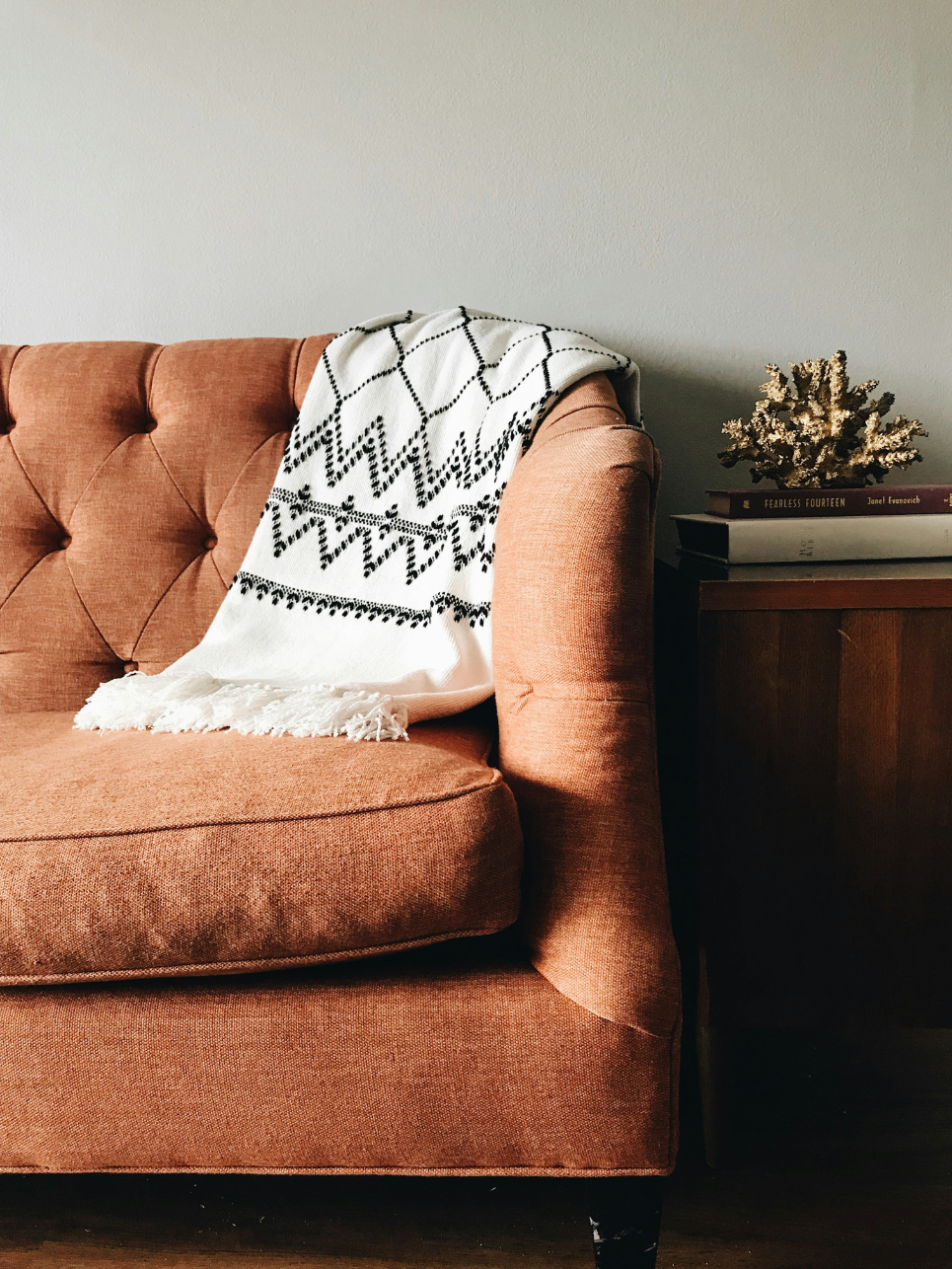 Sofa with blanket stock image