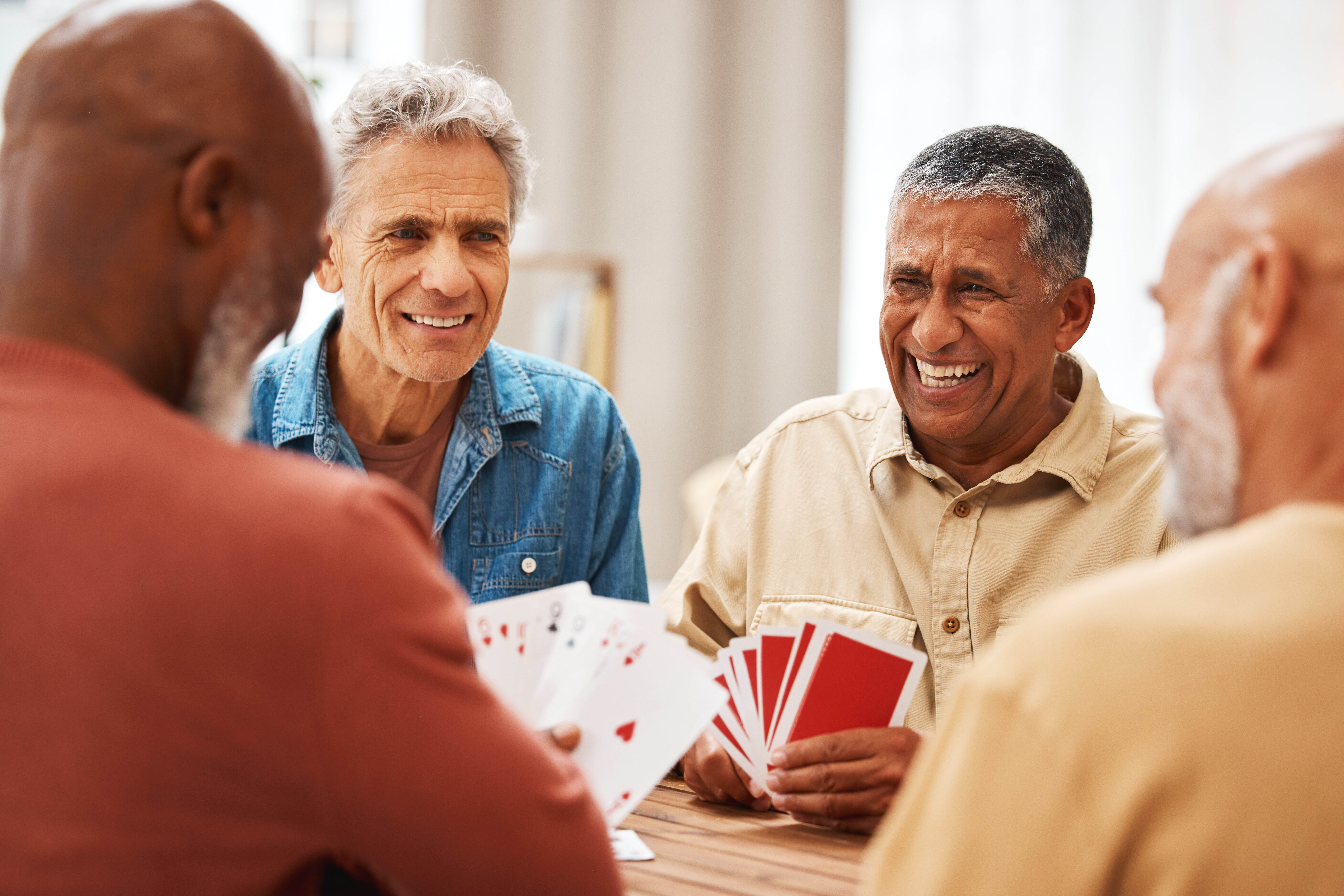 Seniors playing cards stock image