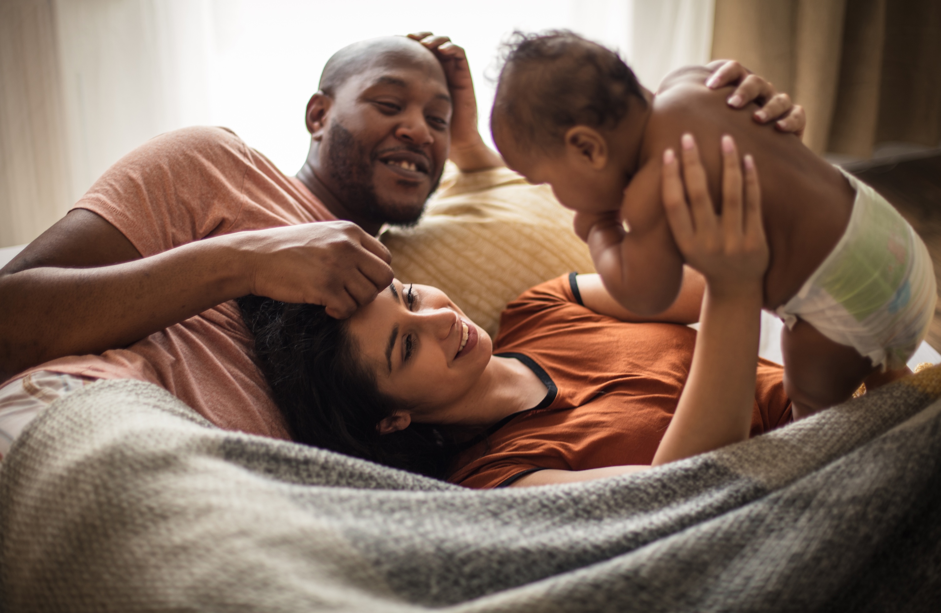 Family on couch stock image