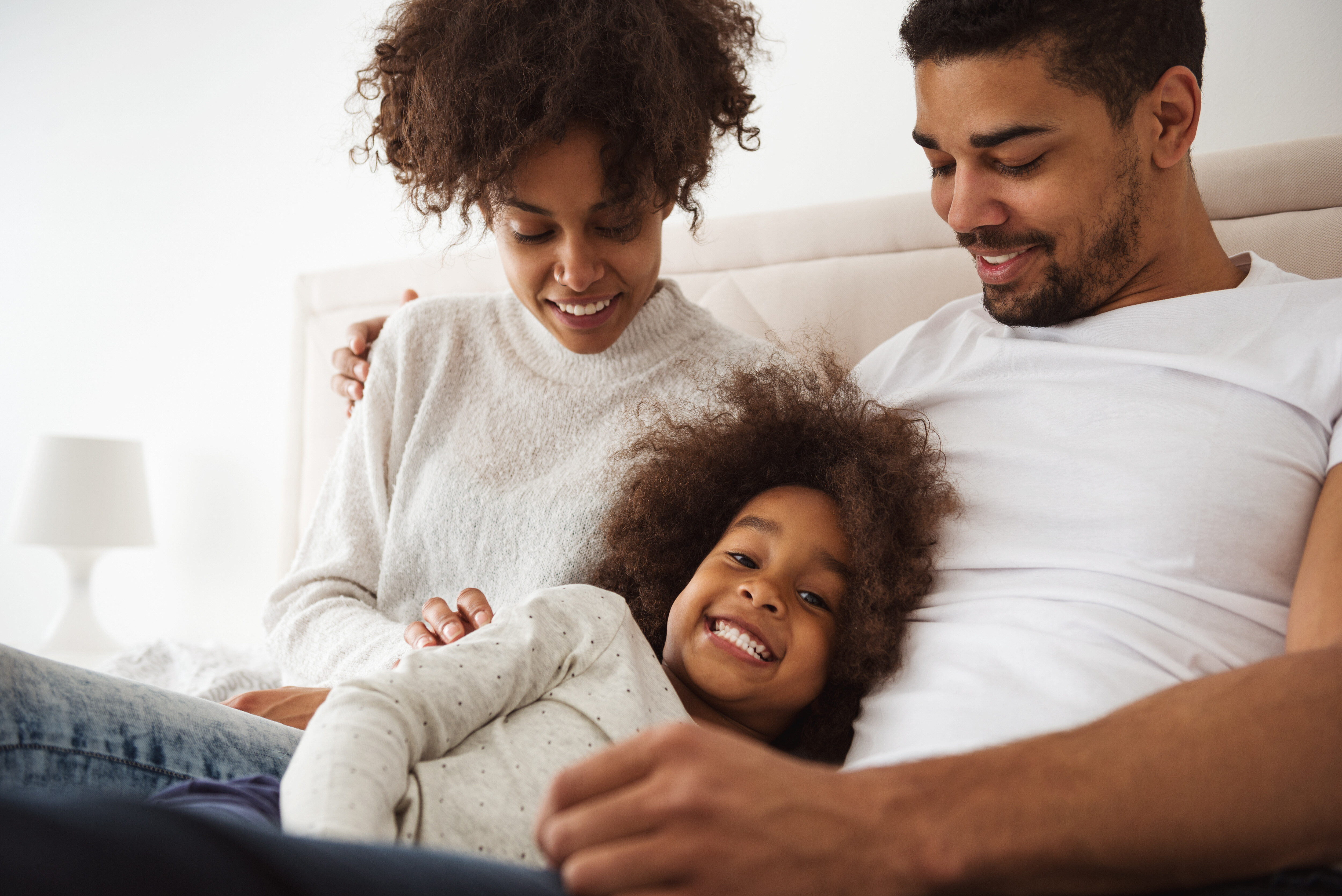 Family on couch stock image