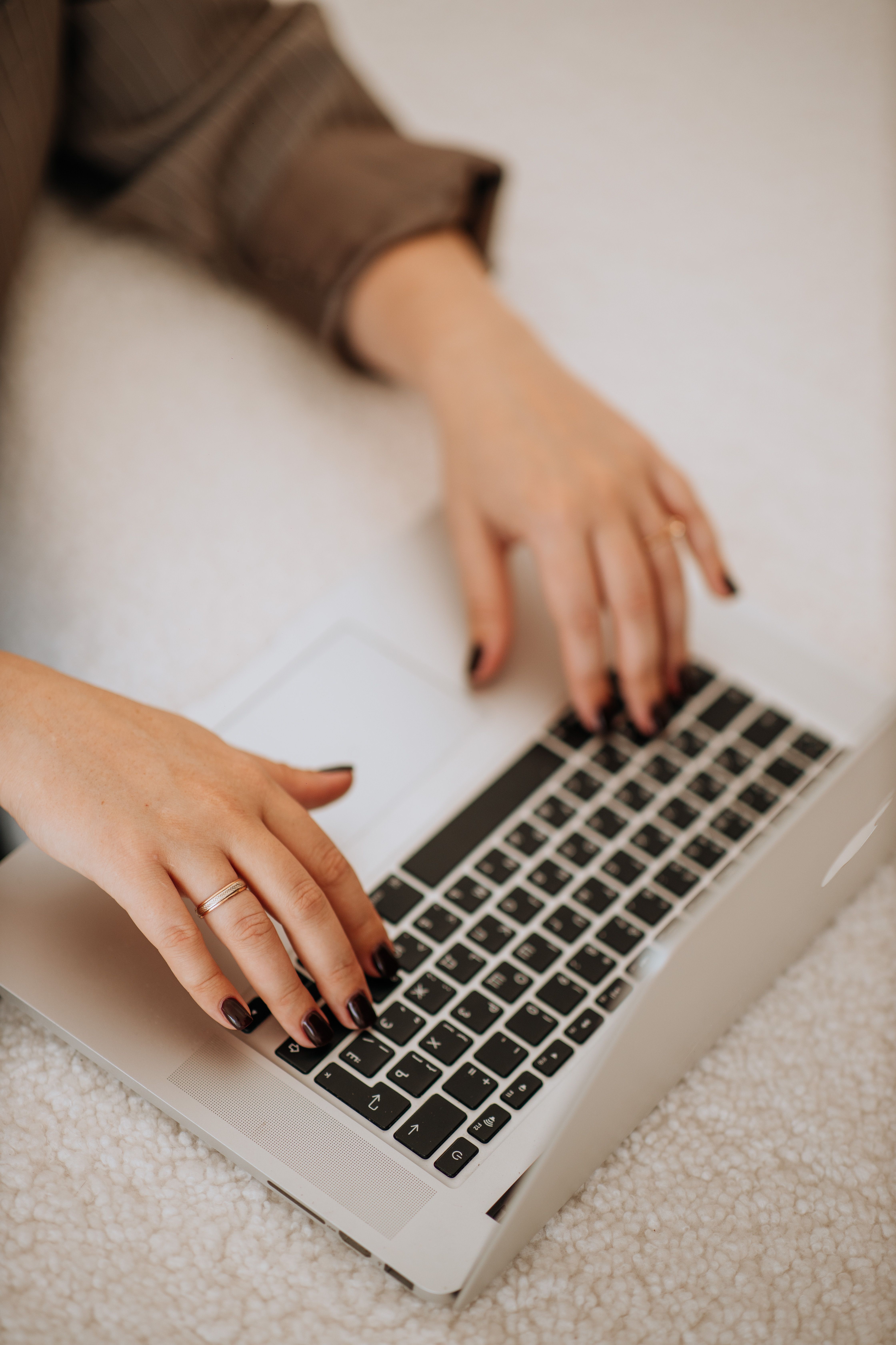 person typing on computer stock image
