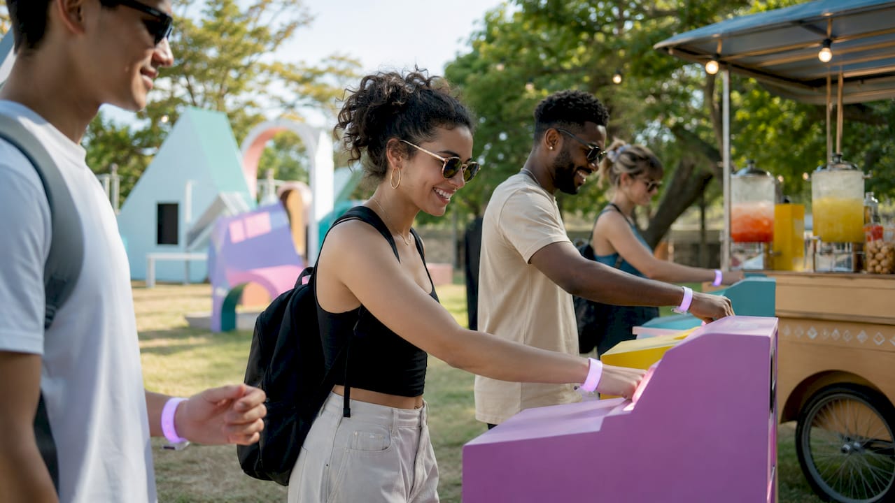 People interacting with wearable tech devices