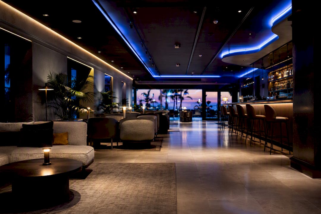Layered LED lighting creating lounge zones