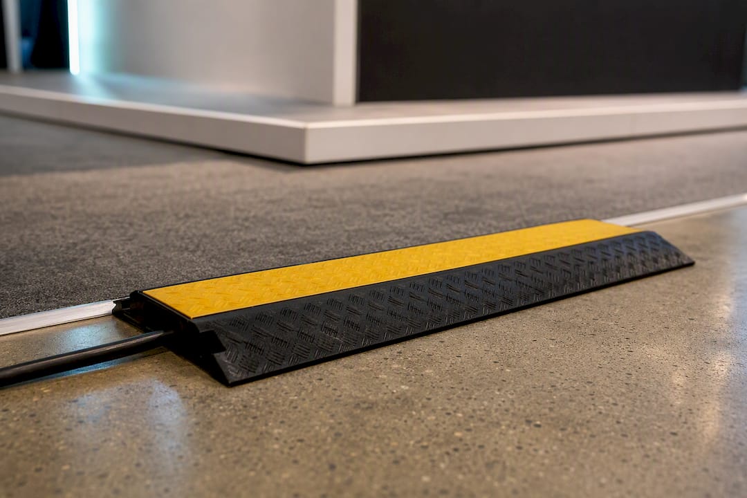 Rated cable ramp covering booth walkway cord