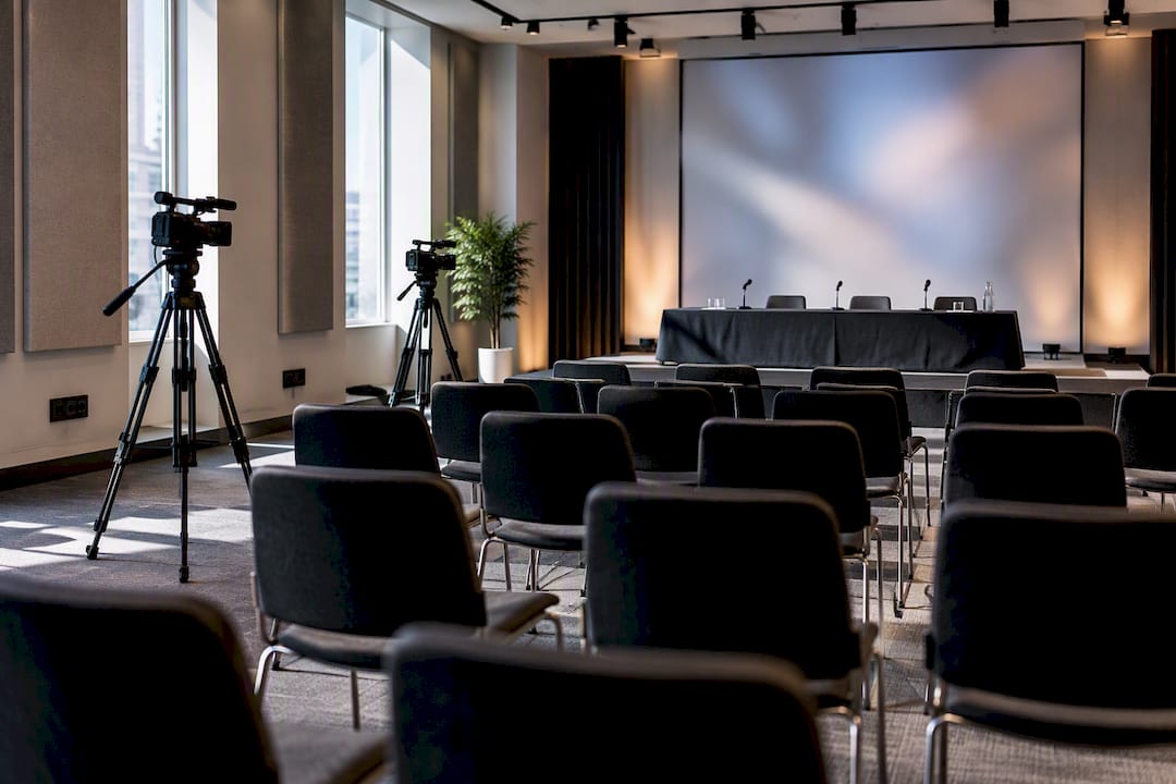 Press briefing room with media seating and power access