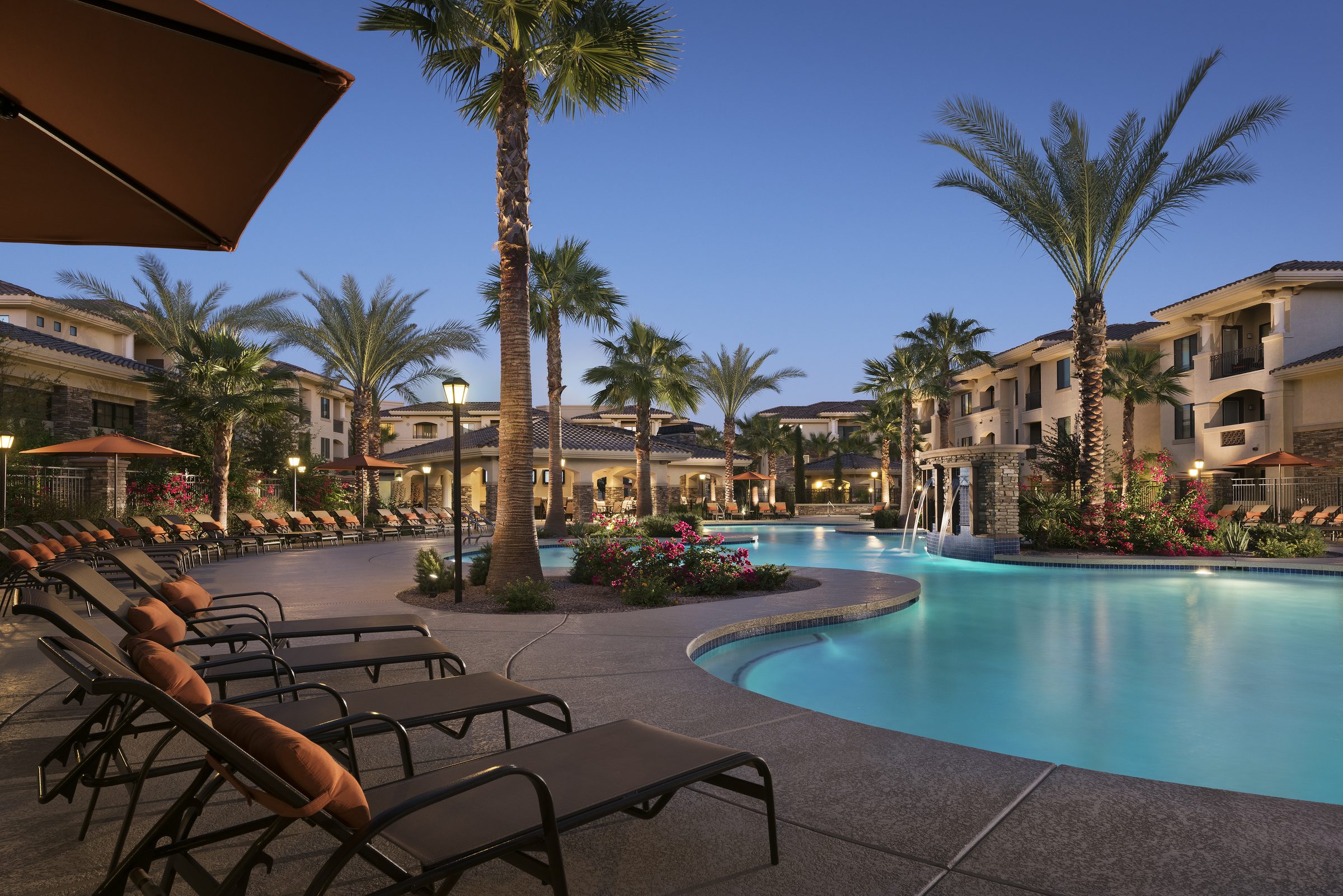A Mark-Taylor community courtyard at dusk in Scottsdale, Arizona