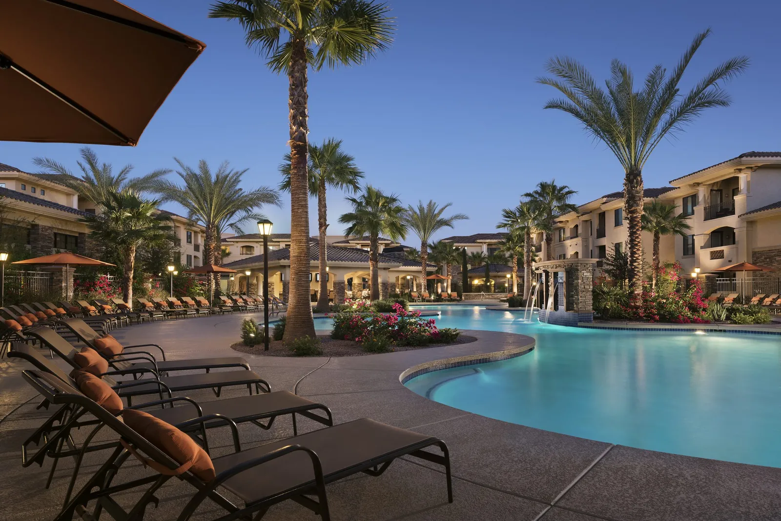 A Mark-Taylor community courtyard at dusk in Scottsdale, Arizona