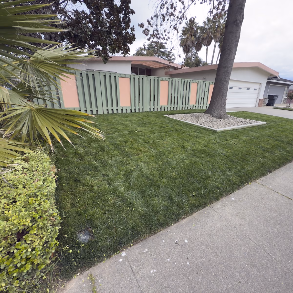 Residential lawn mowing and maintenance by E&E Lawn Care
