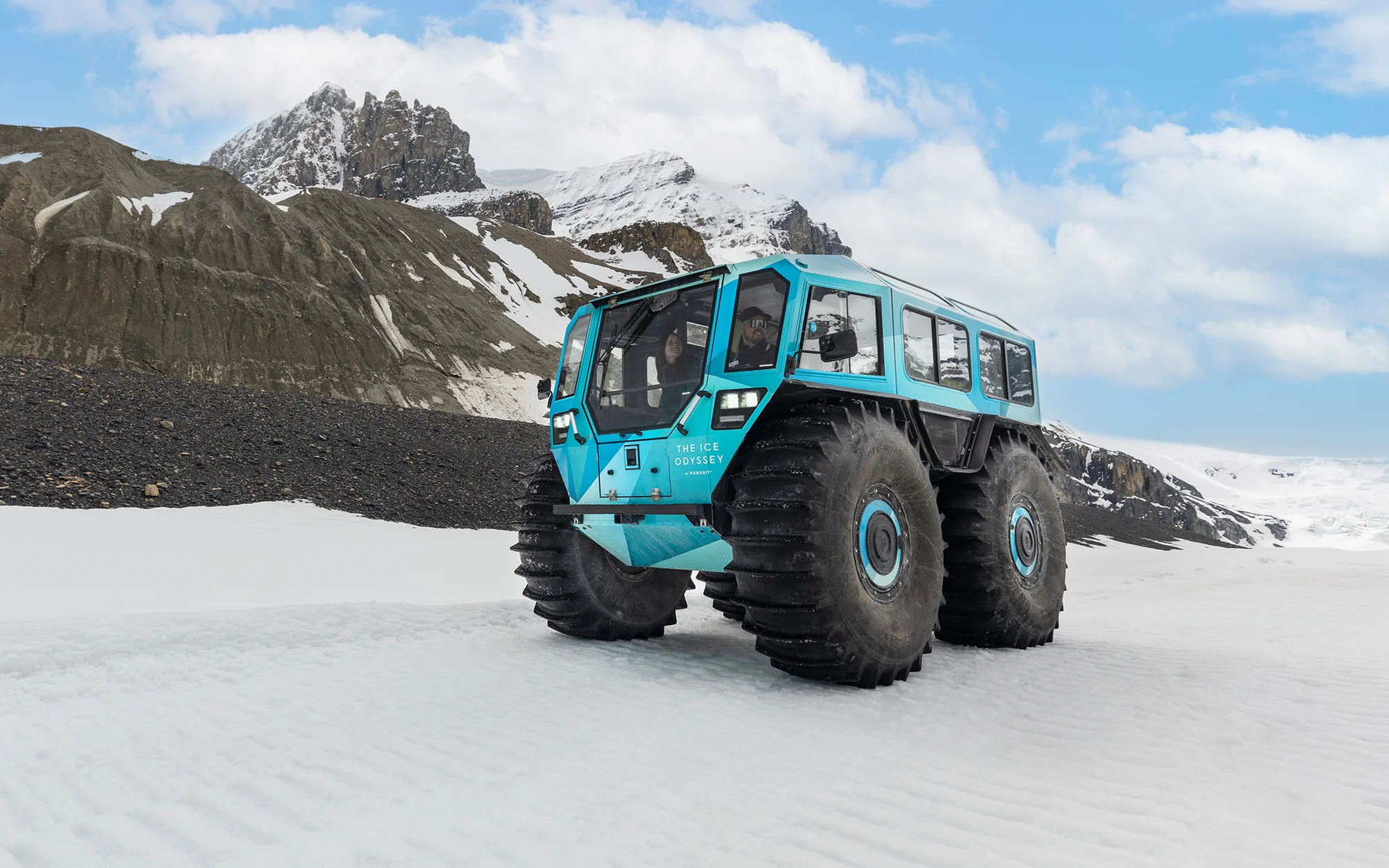 Columbia Icefield Adventure — Ice Odyssey vehicle in glacial jewel wrap at Athabasca Glacier