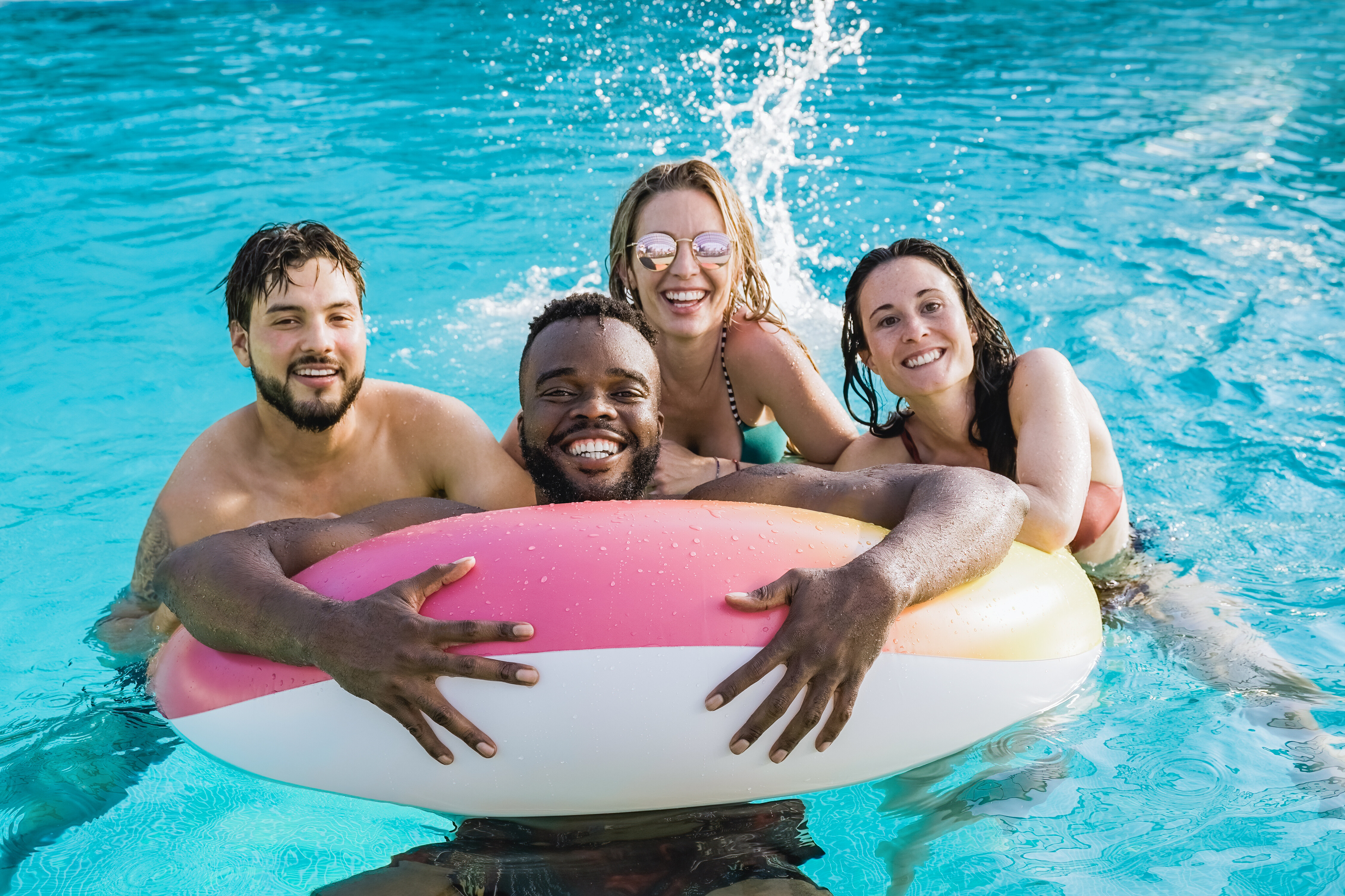 People swimming in pool stock image