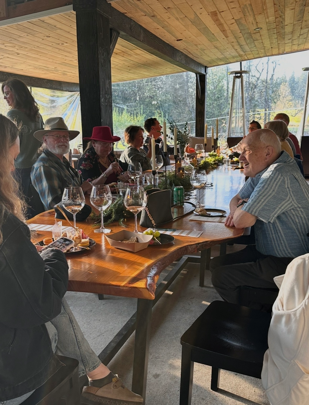 Guests gathered around a long table at the winery