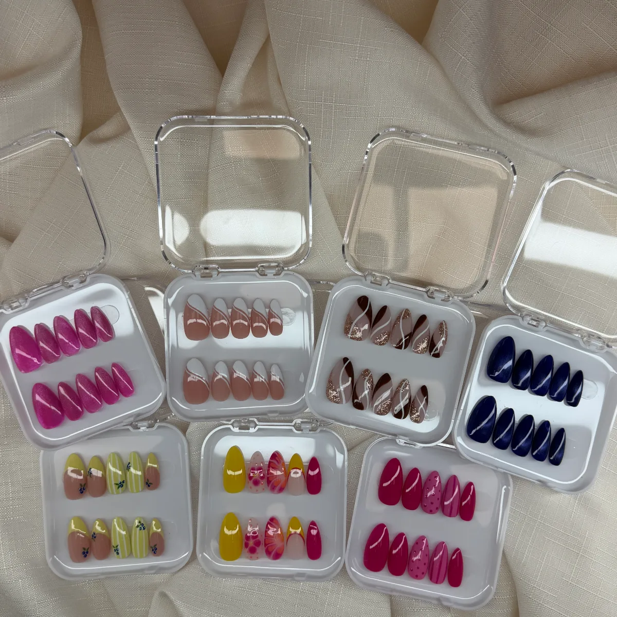 Everlasting Nails hand-painted press-on nail sets in their cases