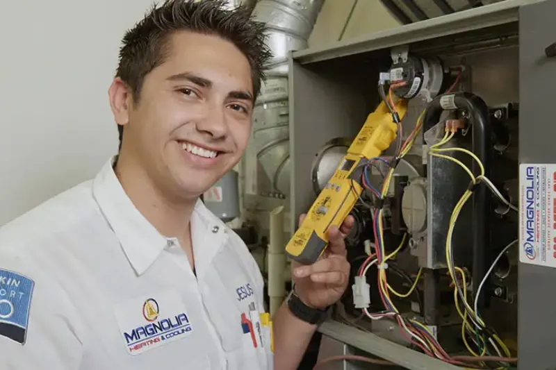 A tech checking a furnace