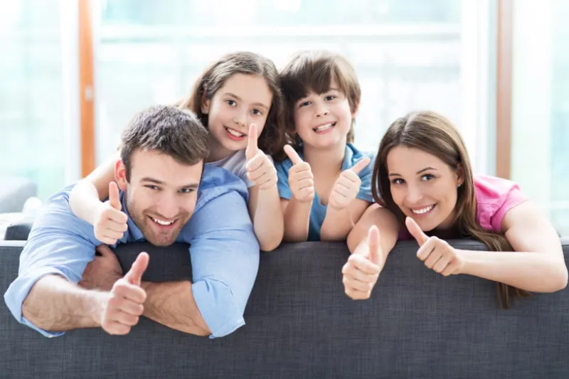 Happy family excited about their new water filter.