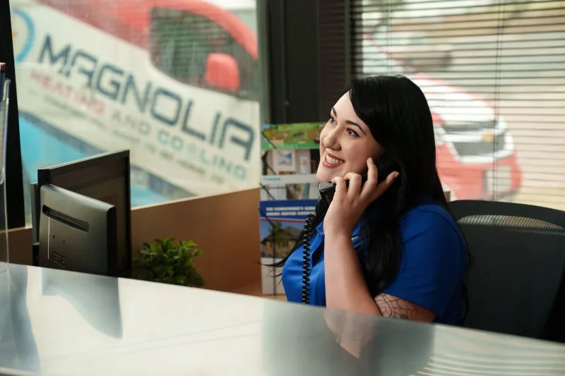A customer service person helping to schedule an appointment.