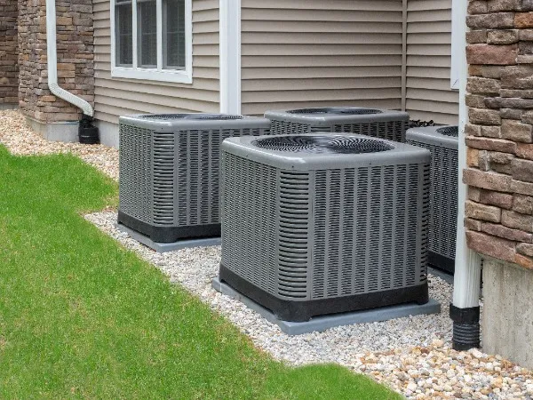 An air conditioning unit with heating pump outside.