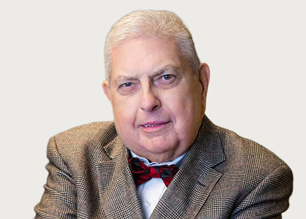 William D. "Denny" Phillips, of counsel to Phillips Froetschel, in memoriam
