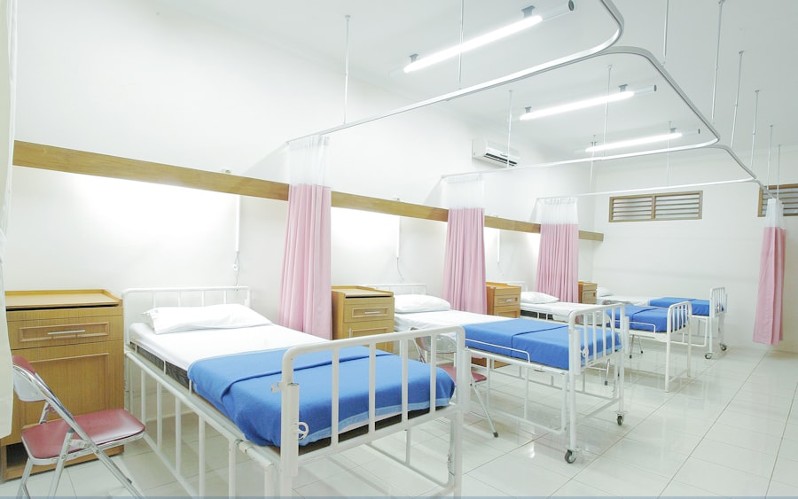 An empty hospital bed in a patient room