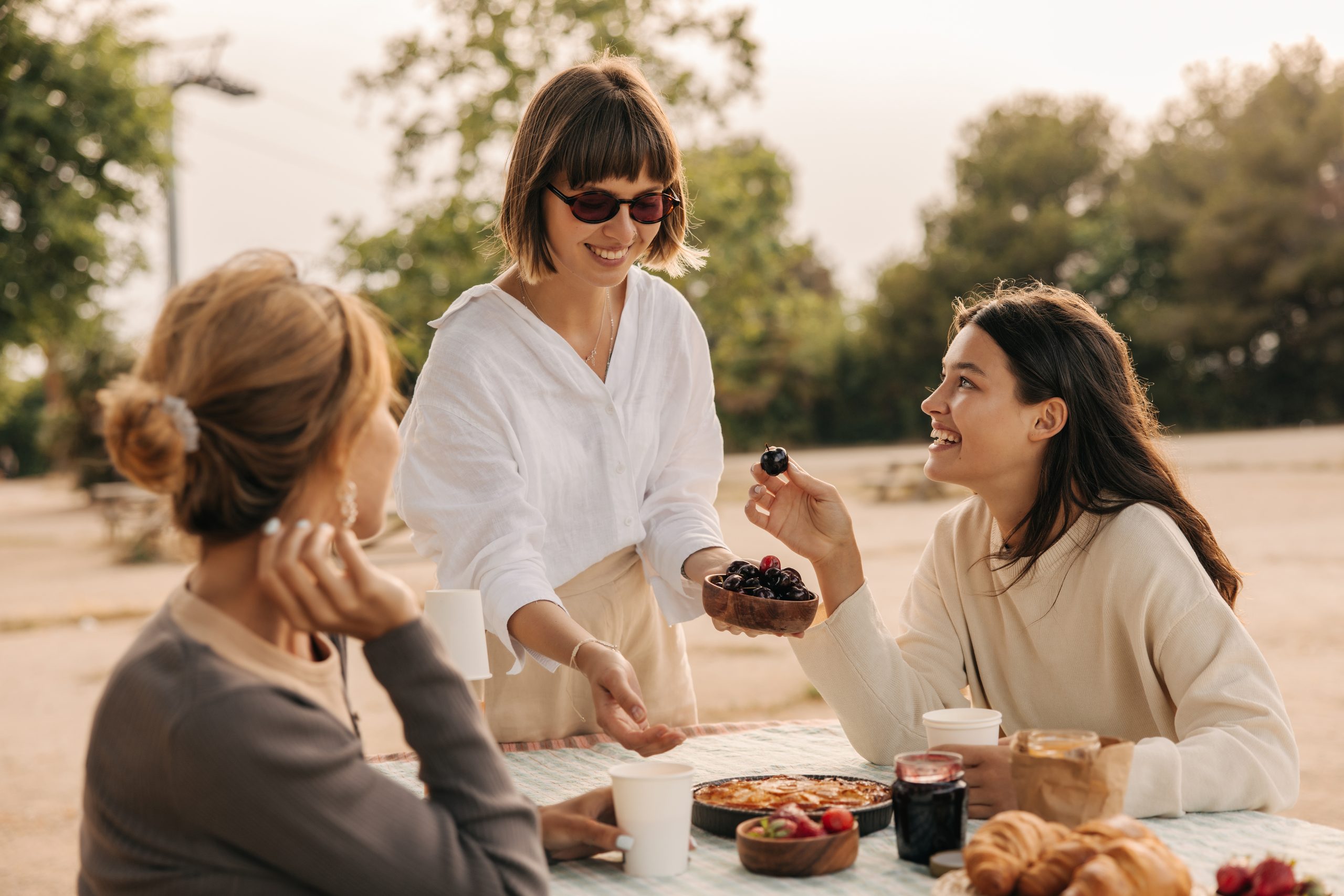 Friends spending time together outdoors on a sunny afternoon