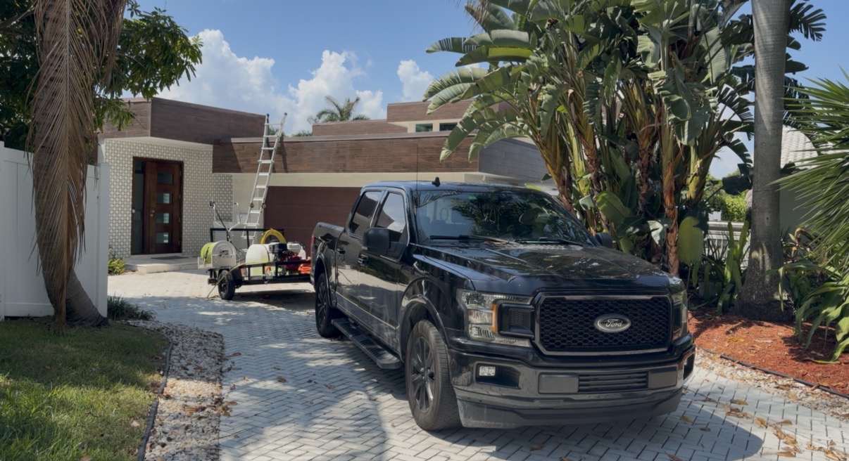 WBC Surface Pros pressure washing rig at a Fort Lauderdale home