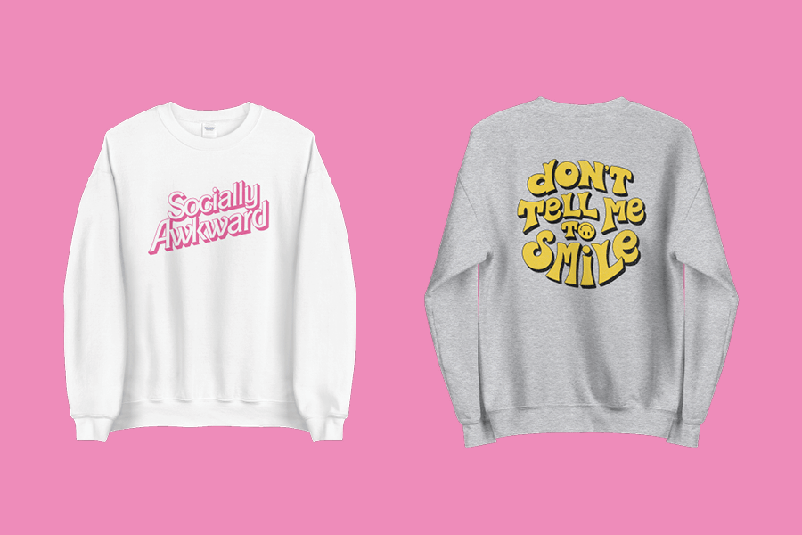 3x4 Aimage of two white sweatshirts on a pink backgroundngles