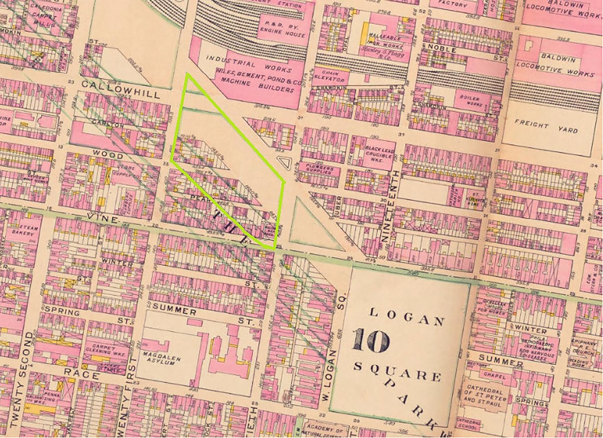 Vintage map highlighting an irregularly shaped block bordered by Callowhill, Vine, and Nineteenth streets in pink and beige, with industrial works, railroad yards, and various labeled buildings surrounding the area, near Logan Square Park marked prominently.