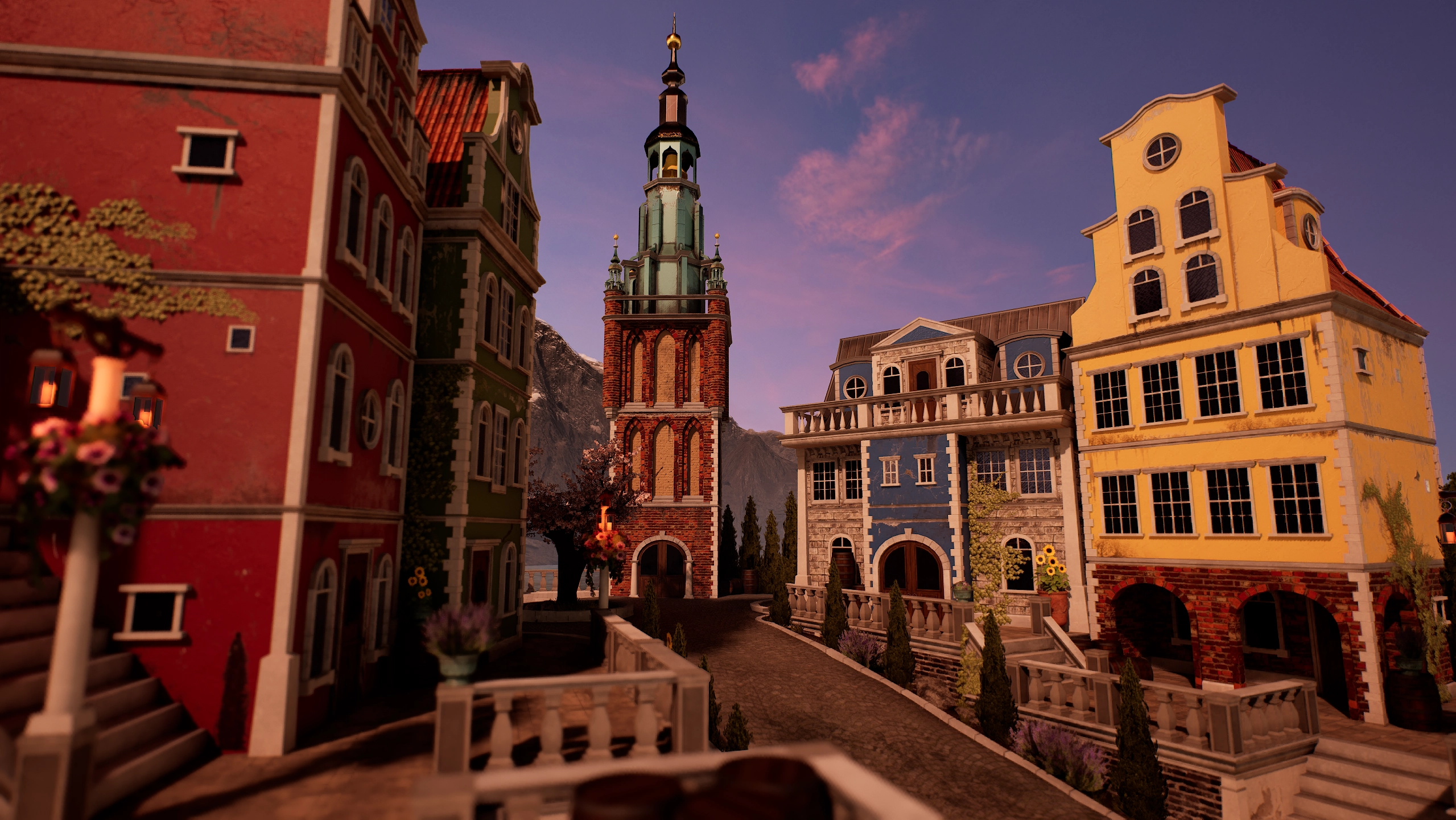 Cobblestone street in a European-style village with colorful buildings and a tall, ornate clock tower at dusk under a purple sky.
