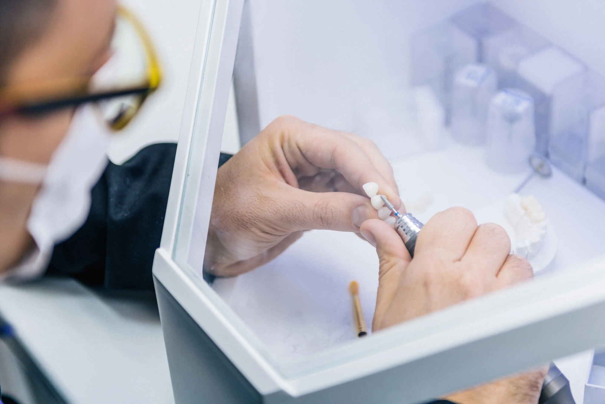 dentist creating a dental restoration