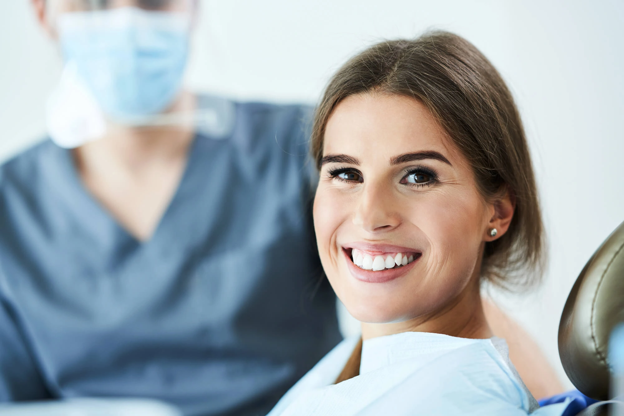 woman smiling at the dentist