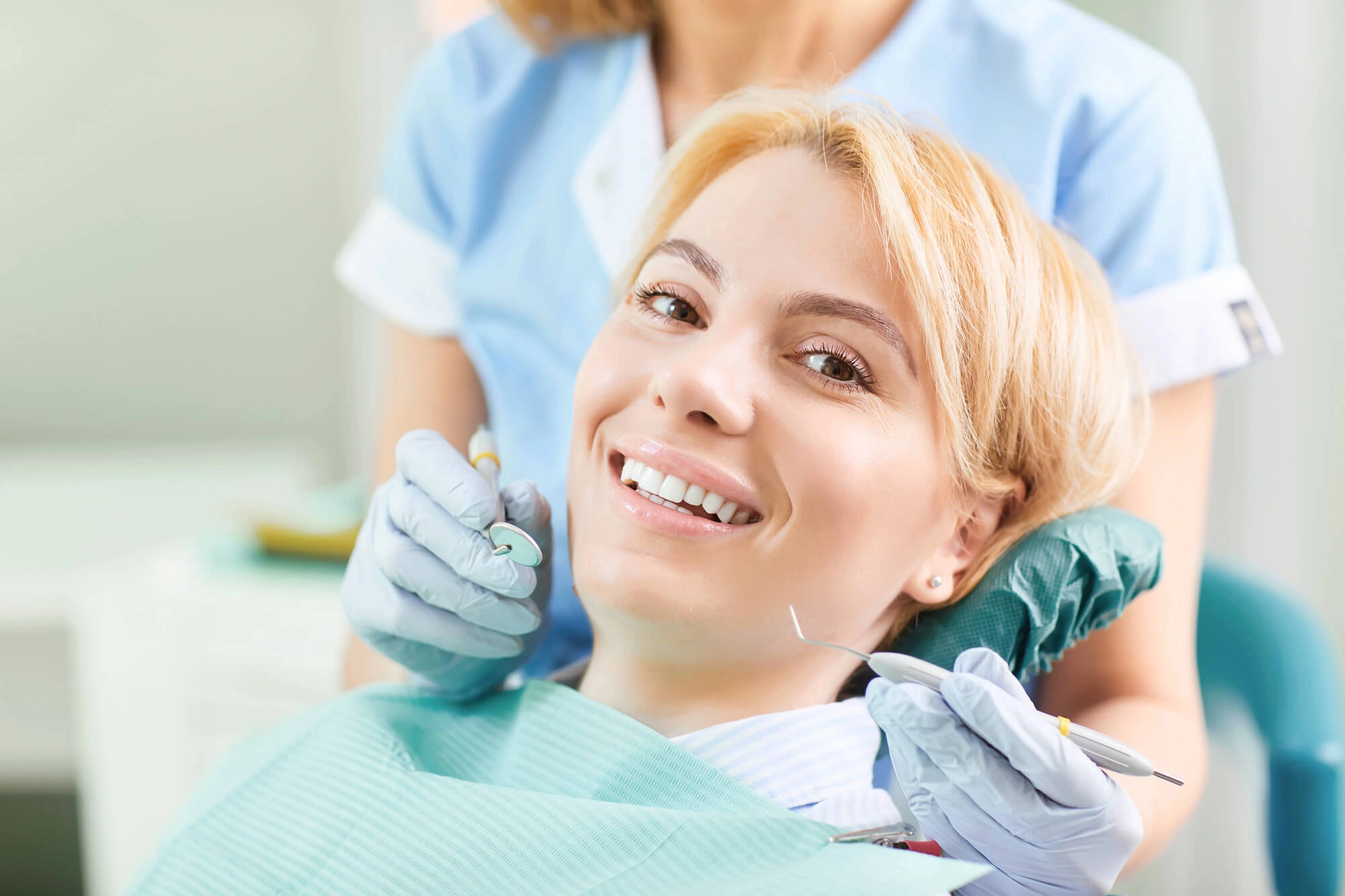 woman at the dentist smiling