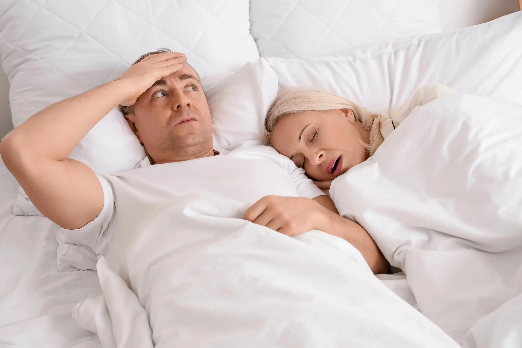 woman snoring and husband bothered