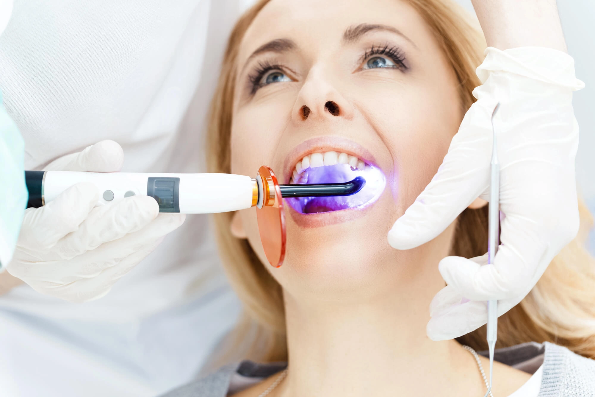 woman getting her teeth whitened