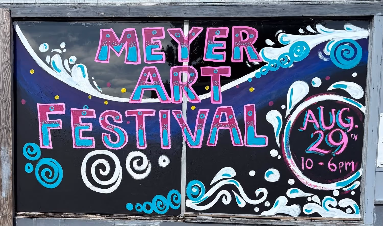 Colorful mural with text 'Meyer Art Festival' and event date Aug 29, 10 am to 6 pm.