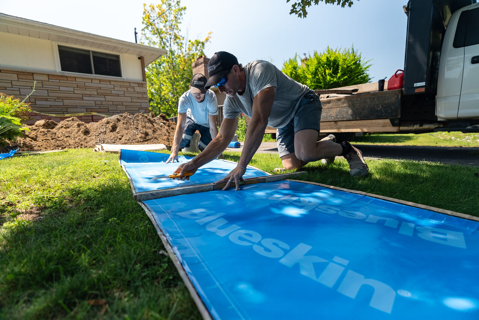 Blueskin membrane measured and cut to size on site