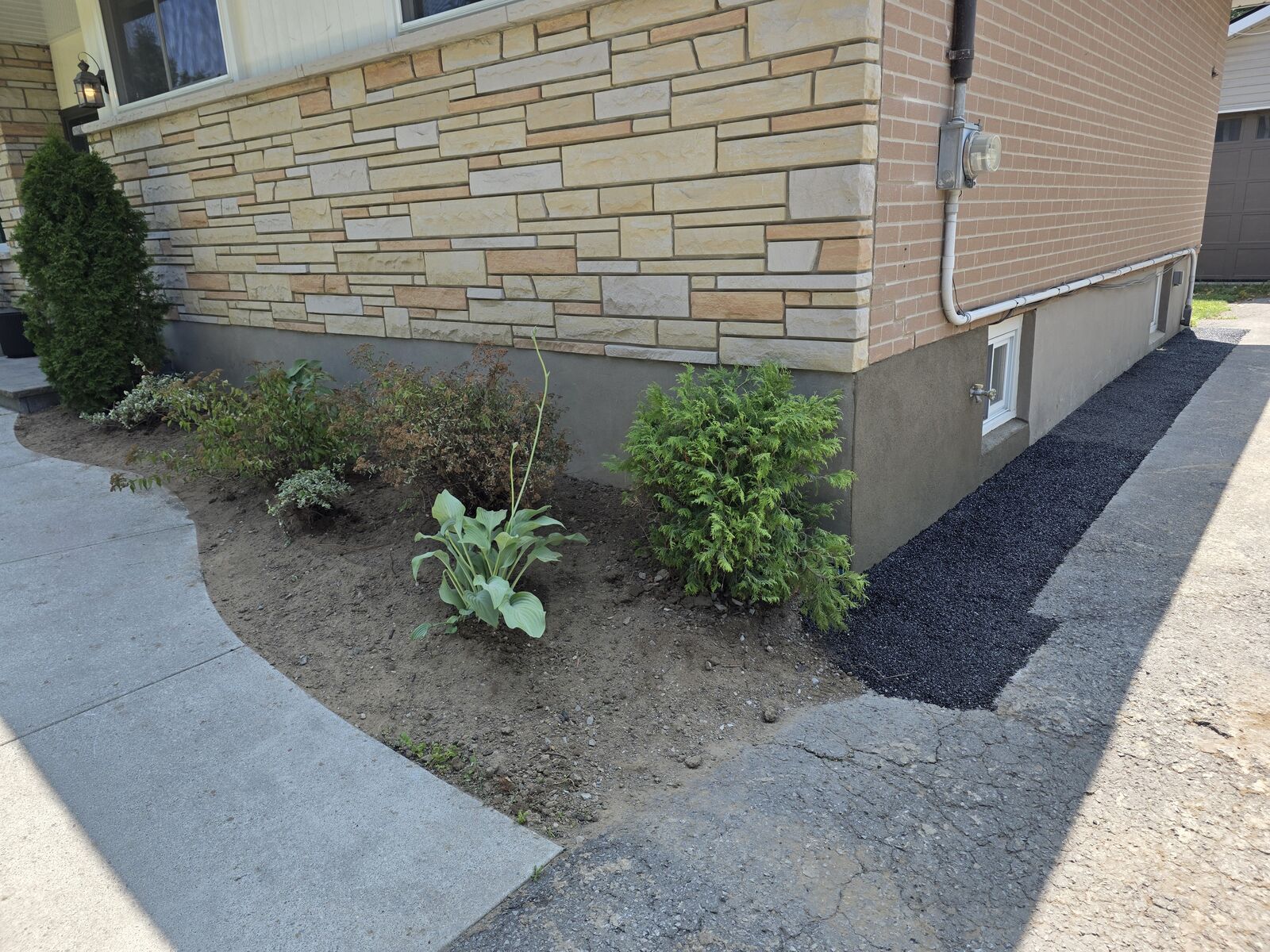 Completed waterproofing project after backfill and cleanup