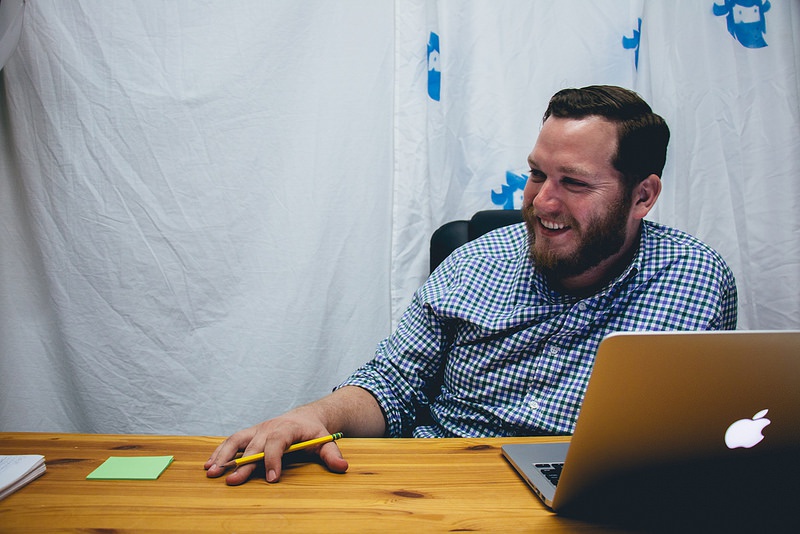 Tim Shipman laughing at a table