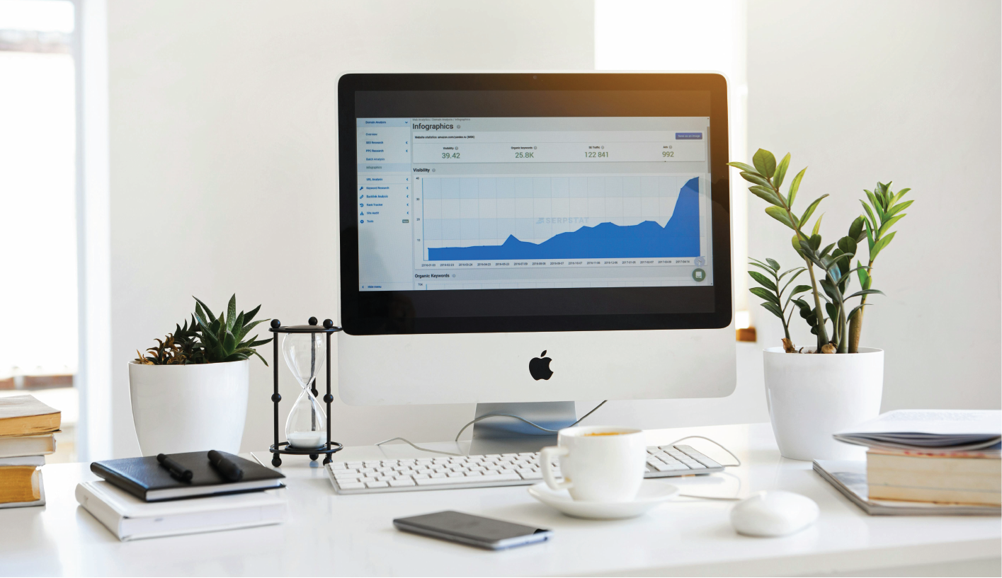 A desktop computer displaying a line graph