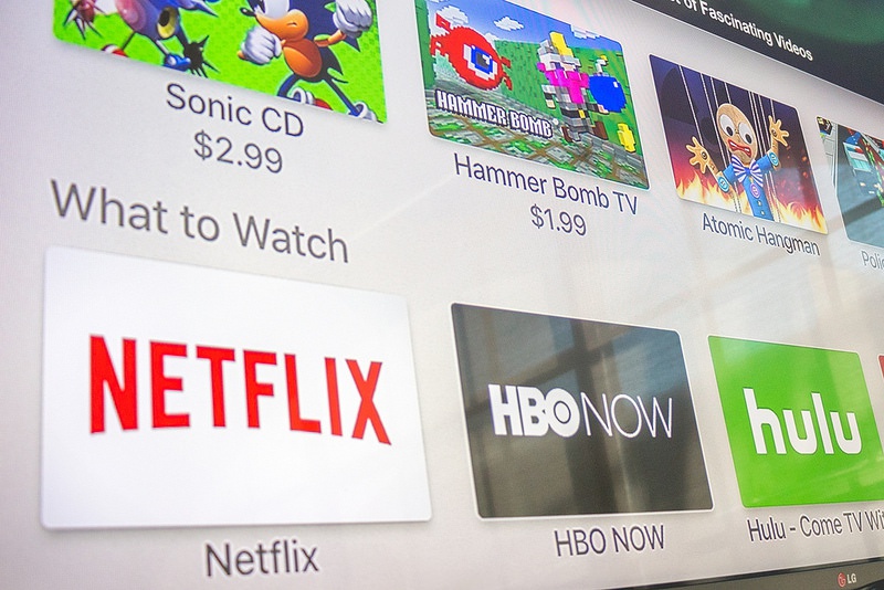 An array of Apple TV apps: Sonic CD, Hammer Bomb TV, Atomic Hangman, Netflix, HBO Now, and Hulu