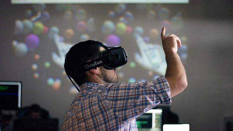 Founding Partner of Yeti LLC, Tony Scherba, playing with the Oculus Rift