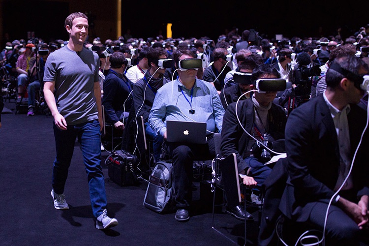 Facebook's founder, Mark Zuckerberg showing employees VR prototypes