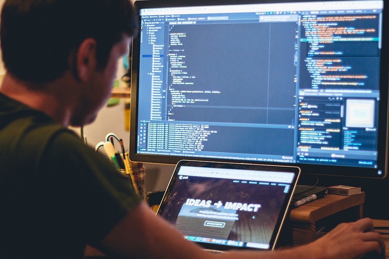 Geoff coding a website