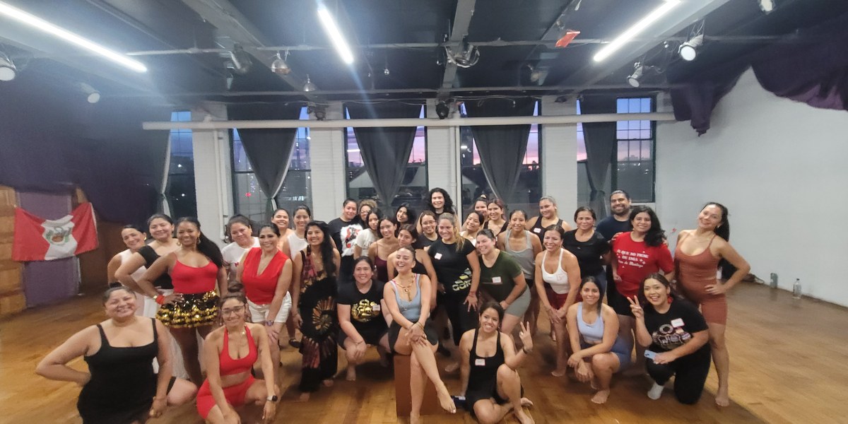 Cynthia Paniagua with a full Festejo class in a New York studio