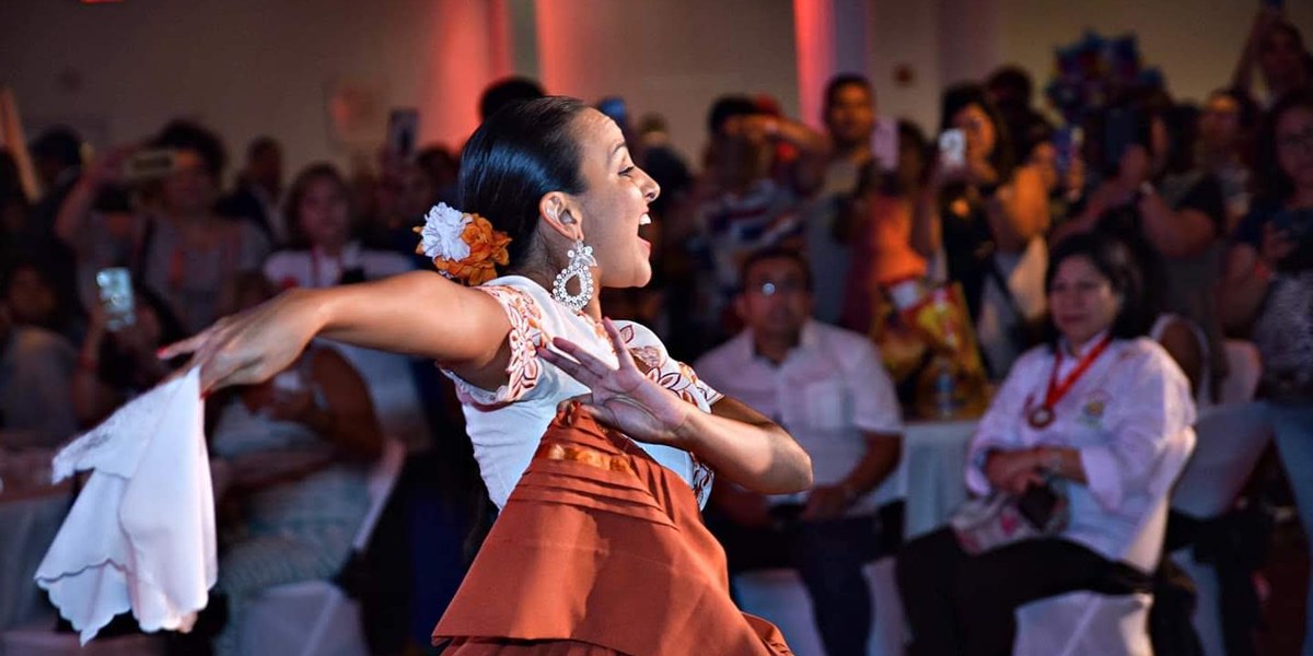 Cynthia Paniagua dancing marinera at a private celebration