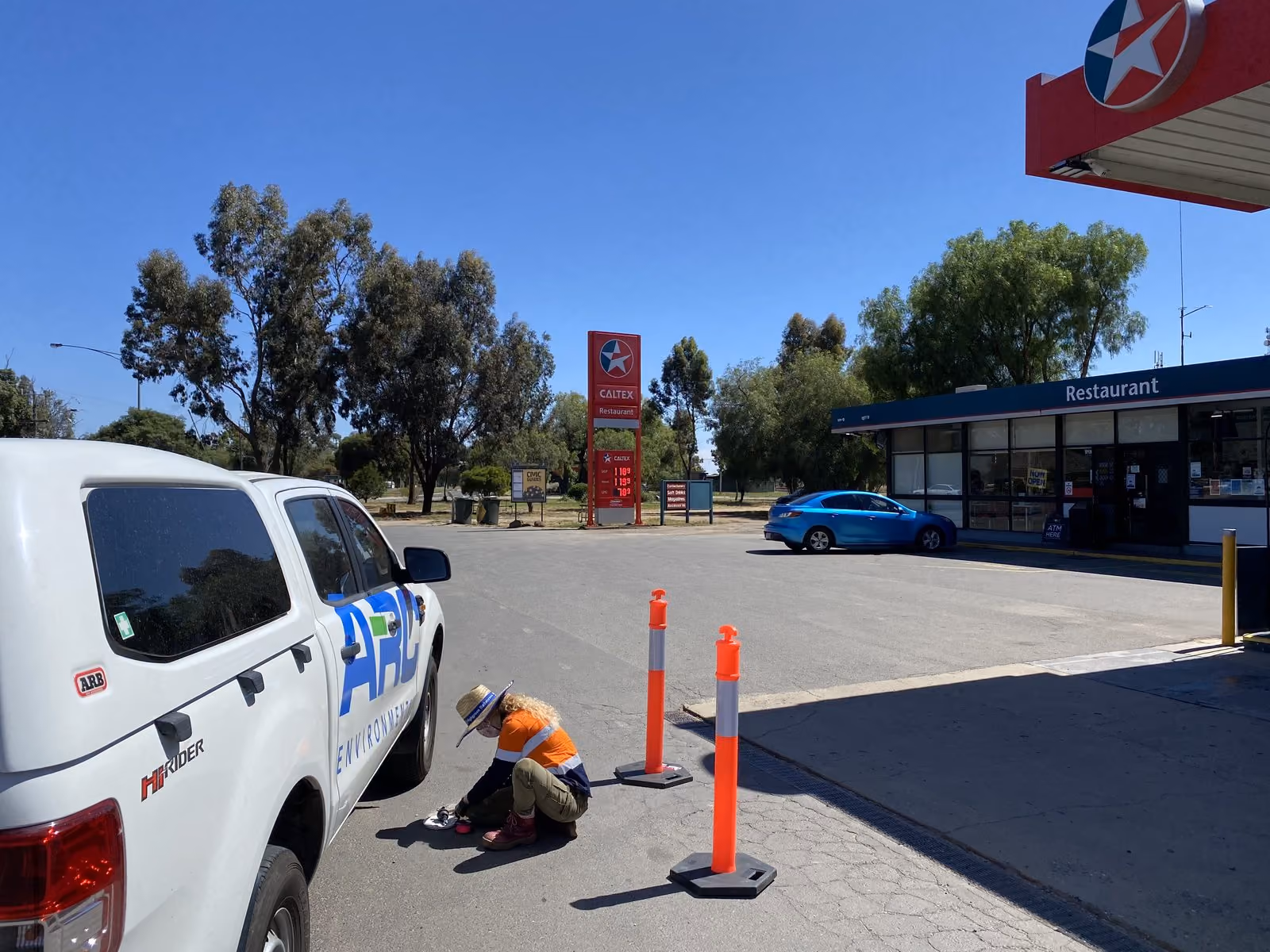 Consultant sampling on a service station forecourt