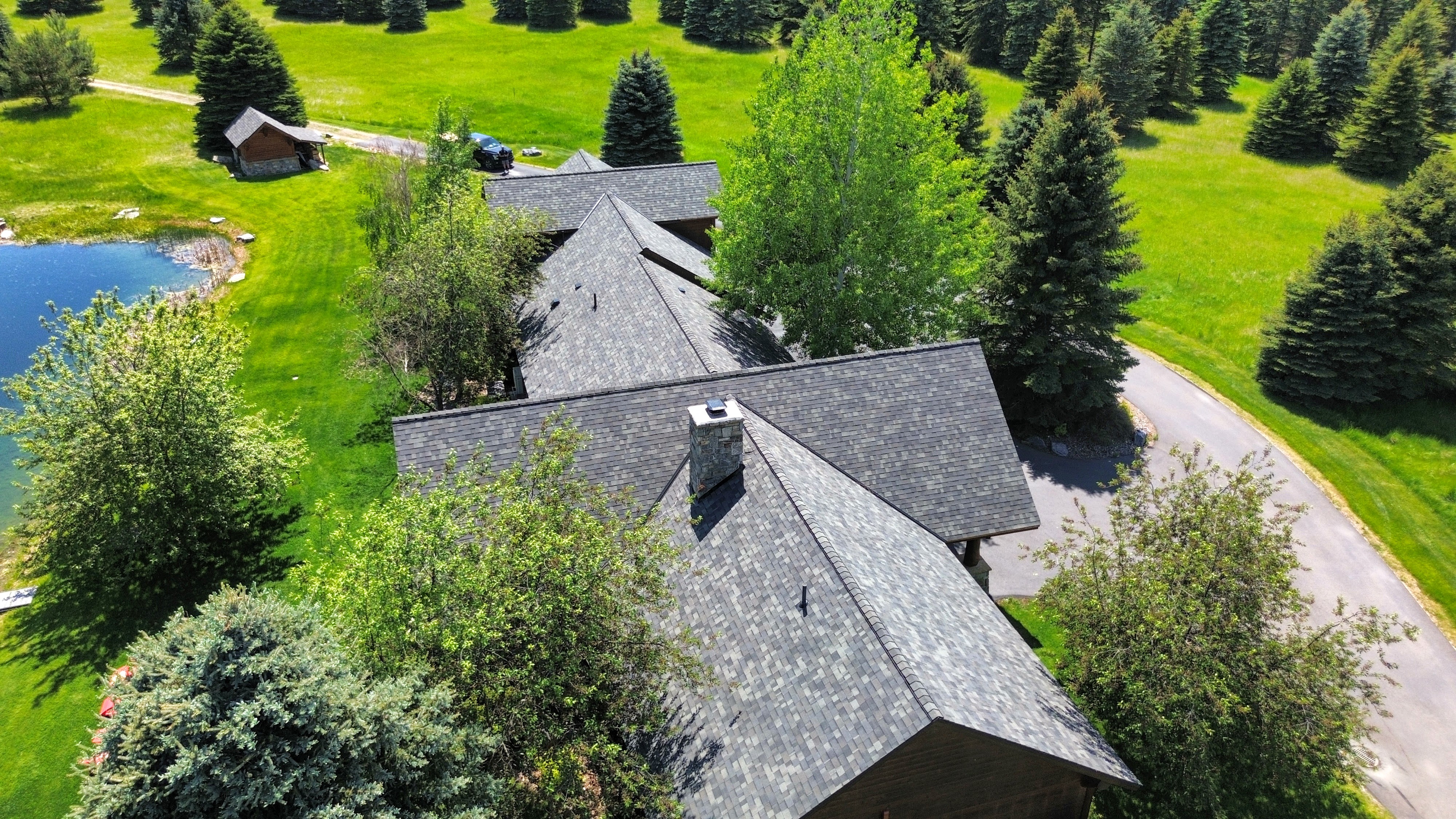 Aerial view of a completed roof on a Flathead Valley home by Grizzly Ridge Roofing and Exteriors