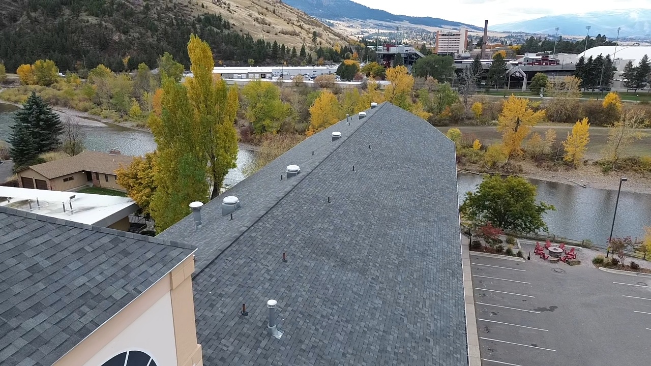 Aerial view of a completed commercial roofing project in Northwest Montana by Grizzly Ridge Roofing & Exteriors