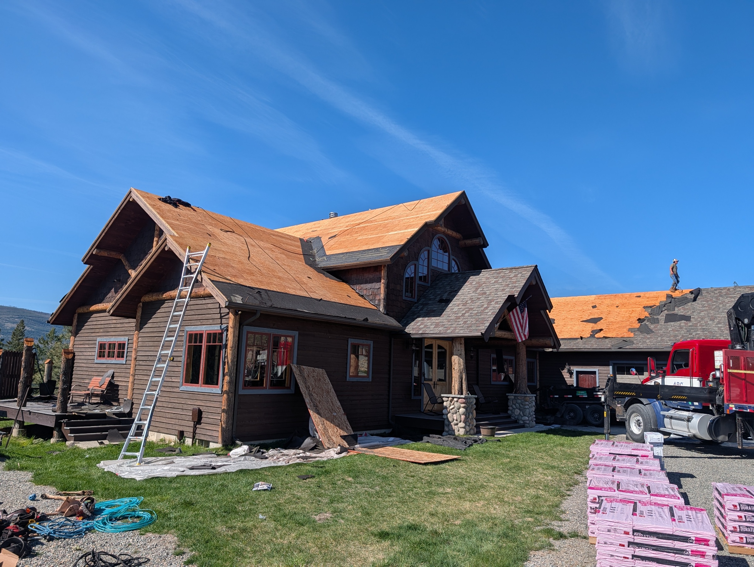 Storm-damaged roof repair on a home in Eureka, Montana by Grizzly Ridge Roofing & Exteriors