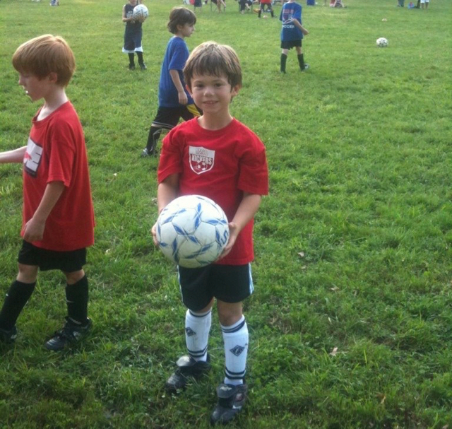 Young Cougar Soccer Club players at a Mini-Kickers session