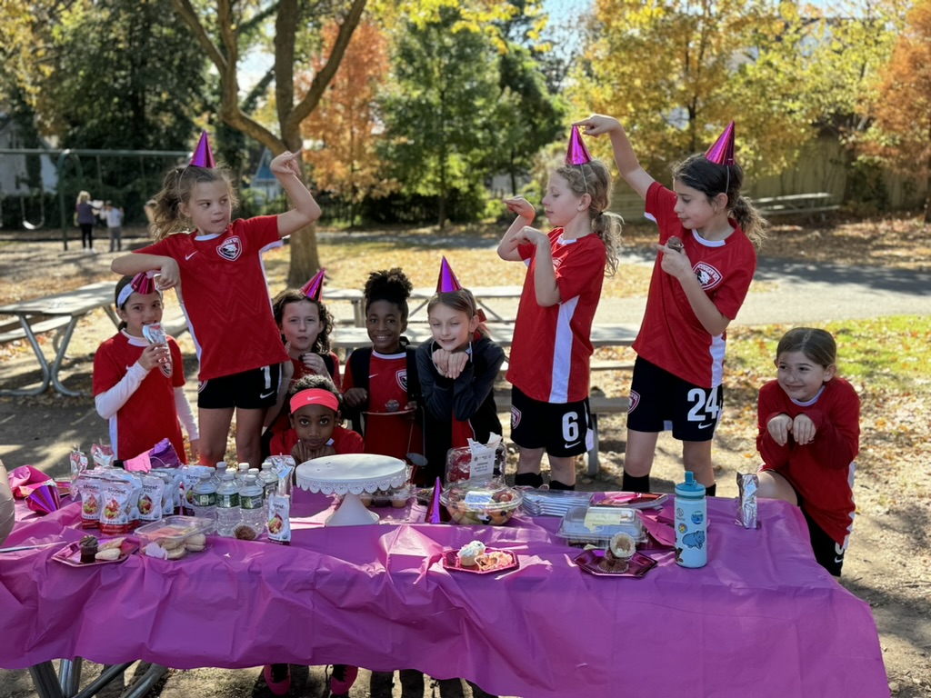 Cougar Soccer Club players at a team celebration